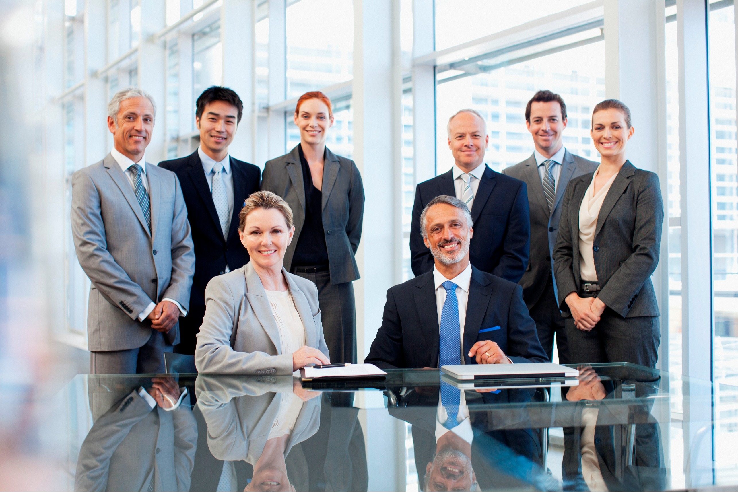 Advisors meeting with clients in office